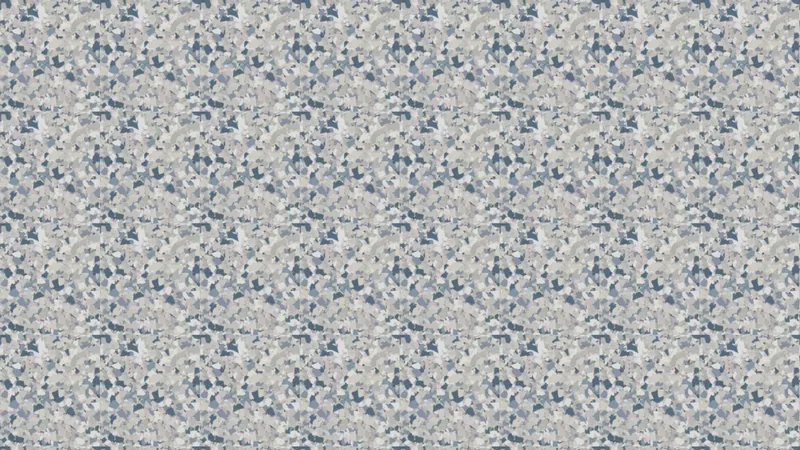 A decorative concrete finish in blue-grey with mixed flecks.