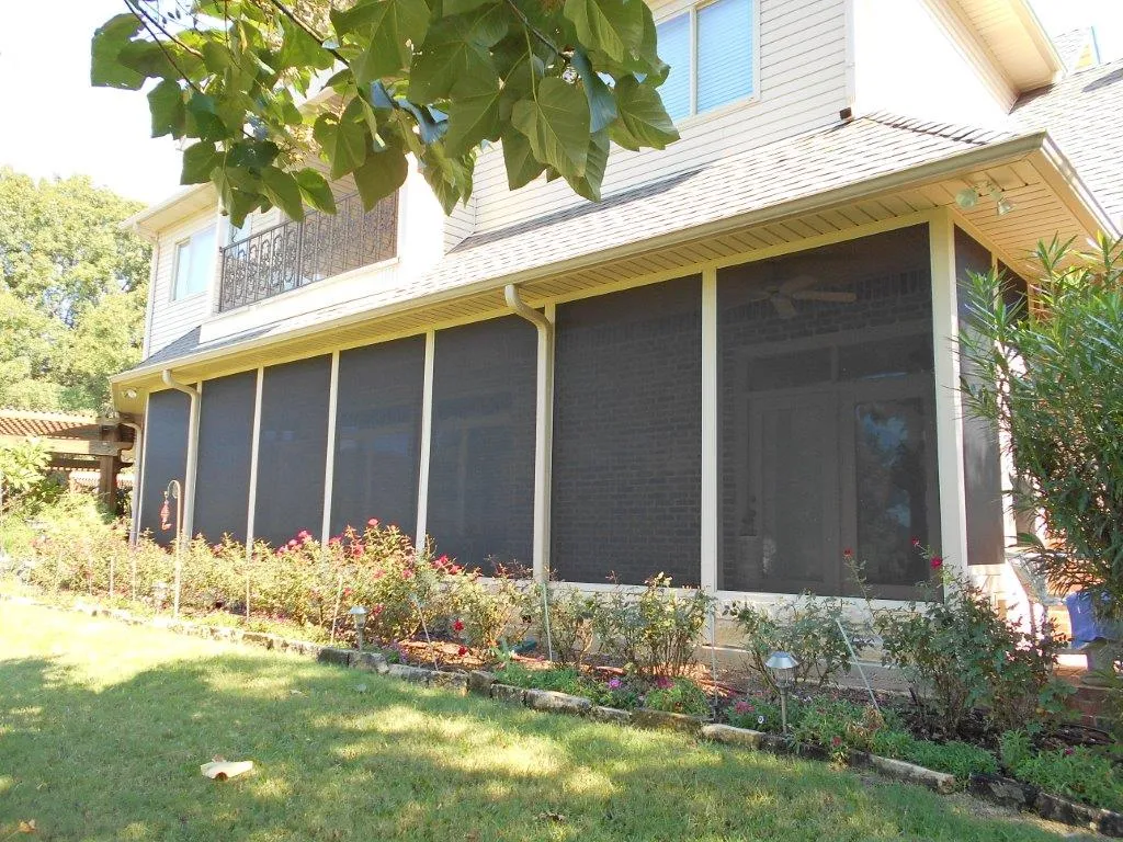 Two-story screened patio enclosure