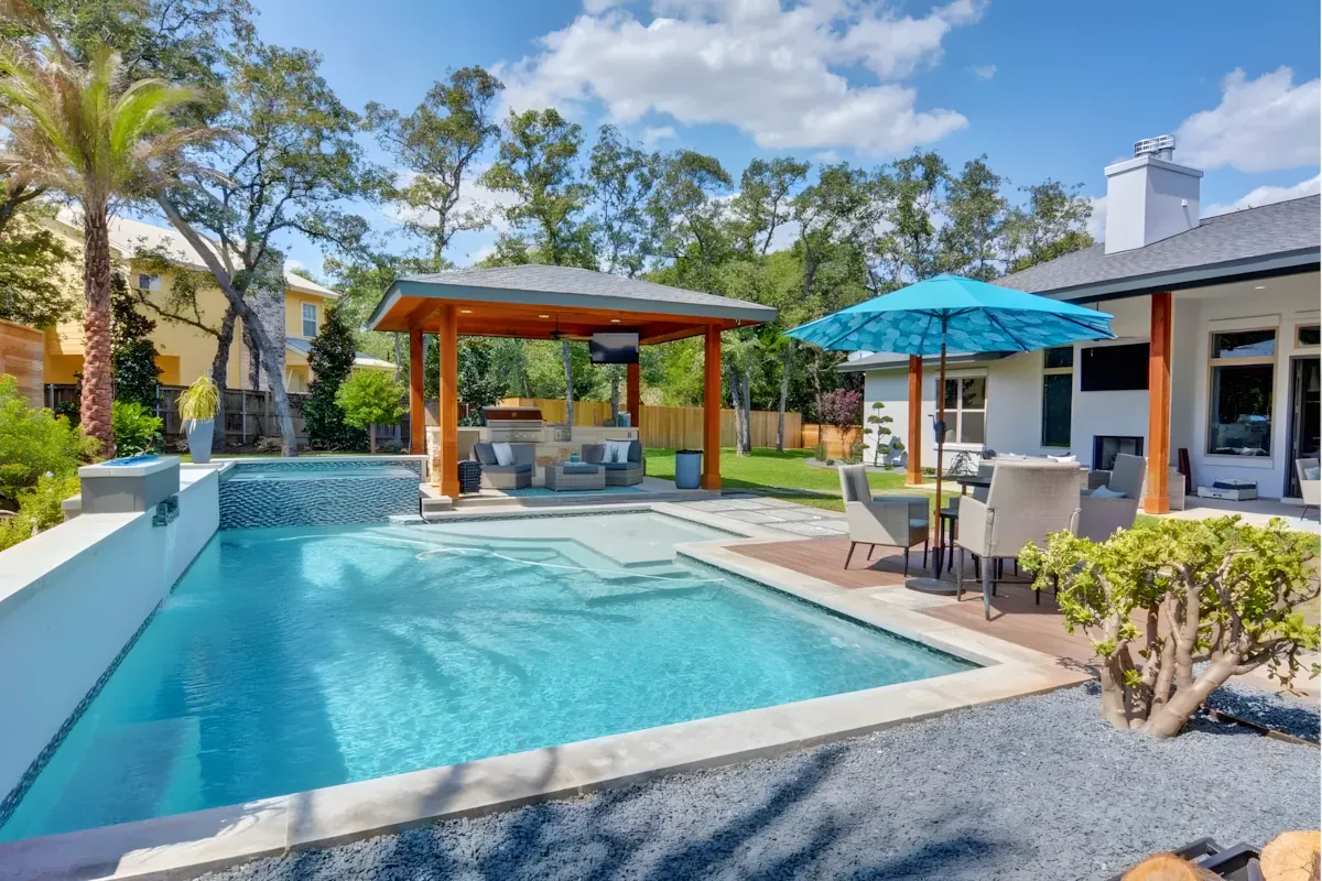 A cut-stone patio and seating area built over North Texas clay soil