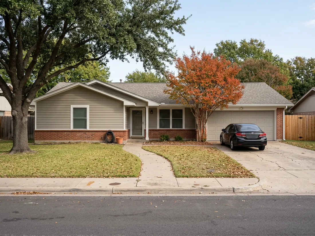Dallas ranch home with straight, freshly painted greige lap siding on a clear fall morning