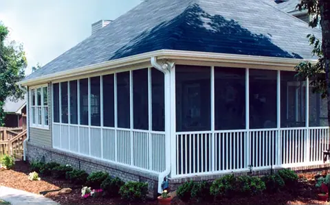 Screened porch with railings