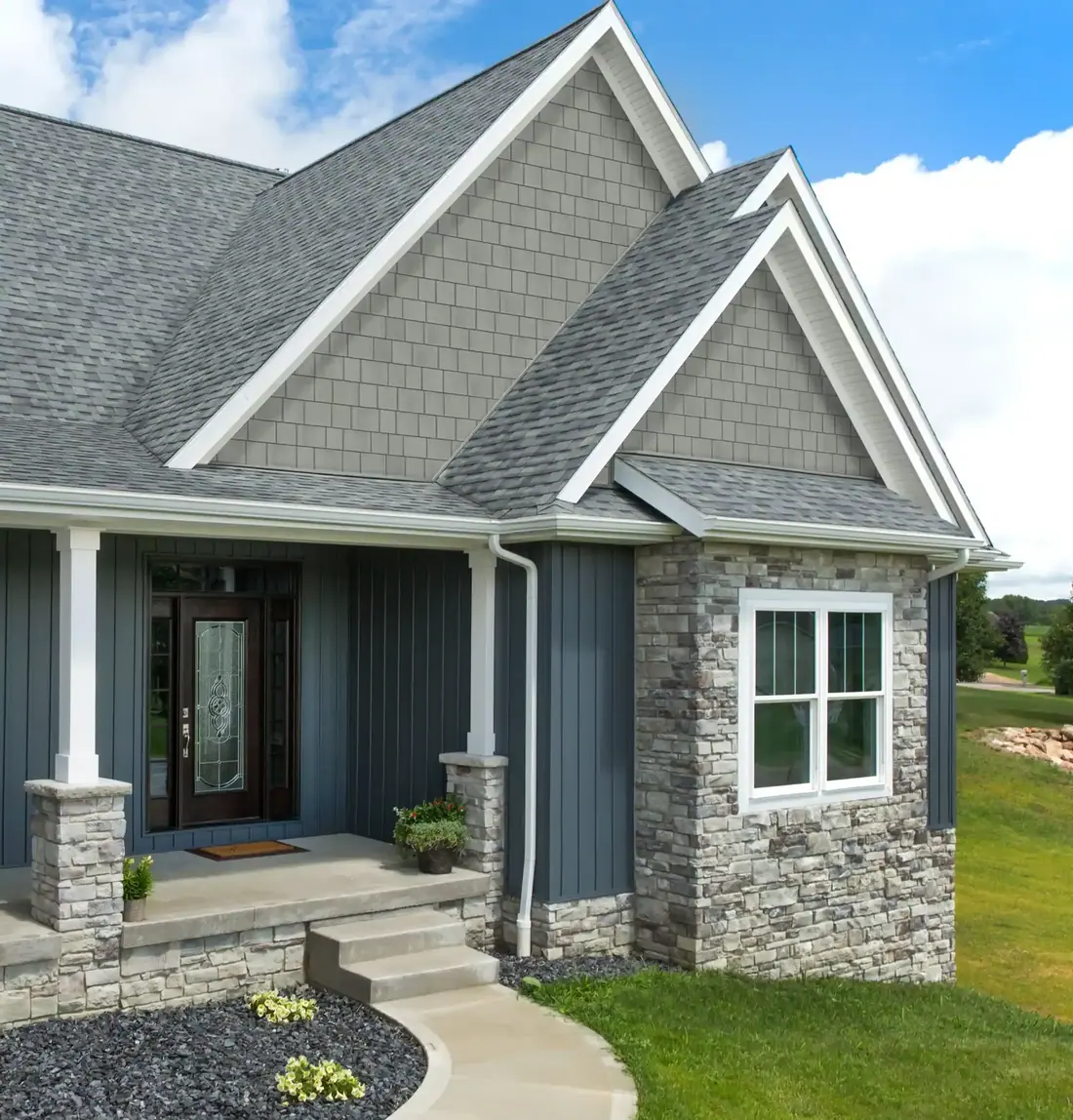 Craftsman exterior with new siding and stone